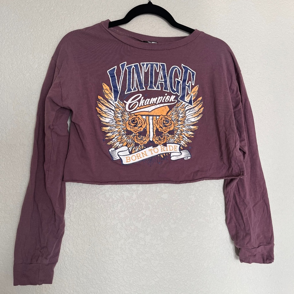 Long sleeve top. Burgandy-ish in color.